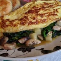 Rosie's Choice Omelet Breakfast · Three-egg omelet with spinach, sliced mushrooms, and white cheddar cheese. Includes a choice...