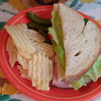 Ham and Swiss Deli Sandwich Lunch · Ham, Swiss cheese, lettuce, sliced tomato and honey mustard.