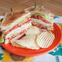 Classic Club Deli Sandwich Lunch · Double-decker oven-roasted turkey, bacon, tomato, lettuce and mayo on toasted bread.