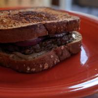 Patty Melt · A one-third pound smash burger topped with caramelized onions and Swiss cheese on grilled ry...
