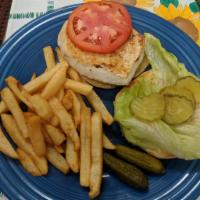 Grilled Chicken Sandwich Lunch · Lightly seasoned and juicy dressed with lettuce, tomato and honey mustard. Served with choic...