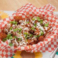 Loaded Tots Lunch · Crispy tots topped with shredded pork, mozzarella cheese, and green onions and drizzled with...