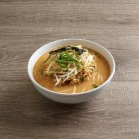Miso · Added miso cites a rich and hearty traditional broth topped with sweet corn served with thic...