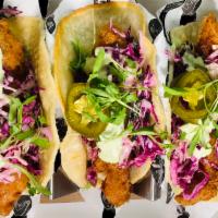 Mermaid Fish Tacos · beer batter, red cabbage, pickled jalapeno & pico de gallo

contains dairy, egg & wheat