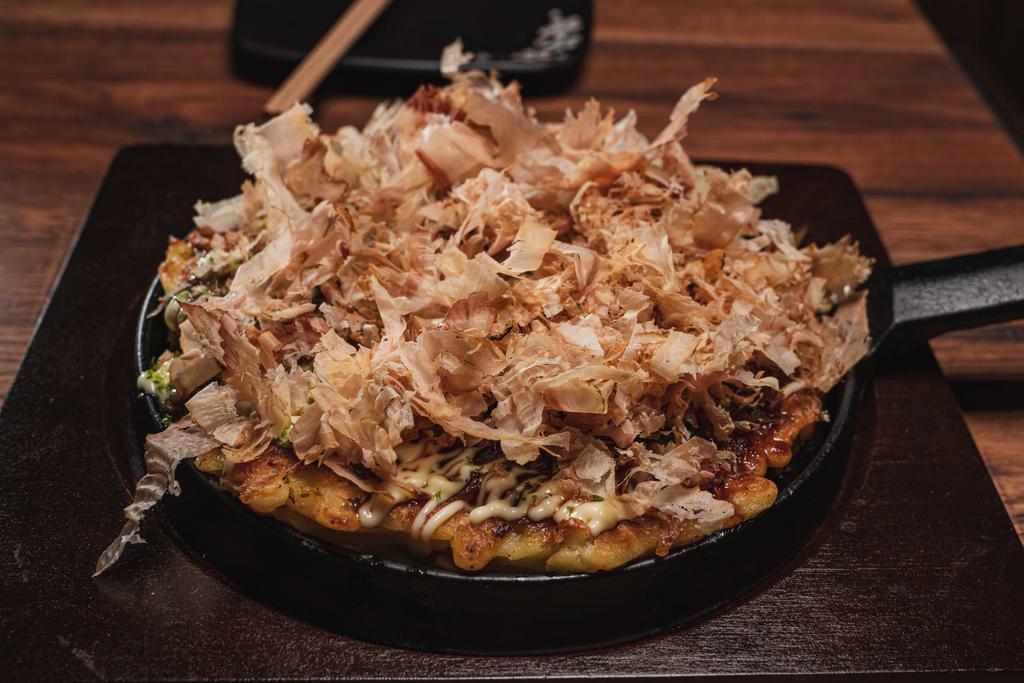 Okonomiyaki お好み焼き - Seafood · Japanese pancake filled with grated yam, cabbage, corn and topped with green laver, bonito flakes, okonomiyaki sauce & Japanese mayo.