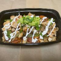 CHICKEN BOWL · Rice, grilled tomatoes, peppers, onions and chicken topped with sour cream and smashed avocado