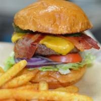 BACON CHEESEBURGER · Half pound beef patty, american cheese, 2 slices of bacon, lettuce, tomato and onion. served...