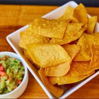 Guacamole and Chips · Avocado, tomato,cilantro, onions and lime juice ( not spicy)
