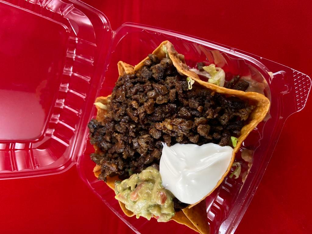 Taco Salad · Choice of meat, with beans, lettuce, cheese. guac and sour cream  