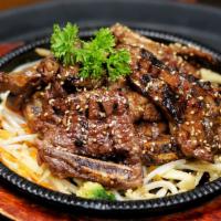 44. Grilled Kalbi Beef Short Ribs (Large) · Grilled marinated beef short ribs.