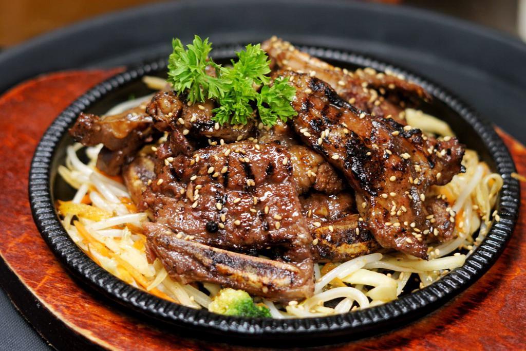 44. Grilled Kalbi Beef Short Ribs (Large) · Grilled marinated beef short ribs.