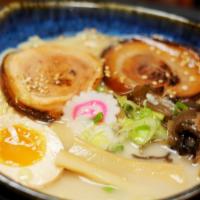 70. Original Hakata Tonkotsu Ramen · Creamy pork bone and sea salt based soup topped with grilled Berkshire pork belly, bamboo, b...
