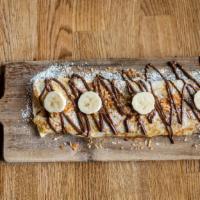 Imperatore · Crepe with nutella, banana and coconut.