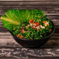 Tabbouli Salad · Crushed wheat mixed with fresh parsley, tomato, green onions and red onions seasoned with le...
