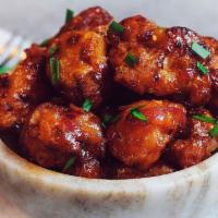 Gobi Manchurian · Indo-Chinese delight. Cut cauliflower pieces, battered, fried, and sauteed over sweet, spice...