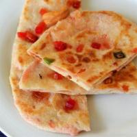 Kashmiri Naan · Sweet naan. Thin layer of Exotic dry fruits and nuts blended to grainy texture stuffed into ...