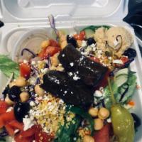 Mediterranean Salad · Hummus, veggie couscous, mixed greens, tomatoes, cucumbers, purple cabbage, Tuscan peppers, ...