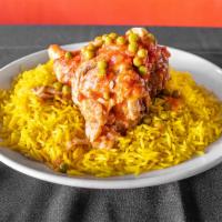 Lamb Shank · A tender lamb shank served in tomato sauce or with sizzling vegetables. Comes with basmati r...
