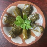 Grape Leaves  · Vegetables. 6 pieces. Grape leaves stuffed with a mixture of parsley, green onions, tomatoes...