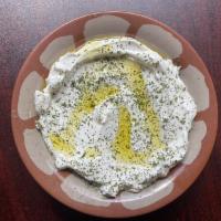 Tzatziki Dip · Greek Yogurt mixed with Cucumbers, Garlic, Fresh Mint and Mediterranean Spices and Herbs. Se...
