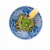 Kaiso Seaweed Salad · Hiyashi wakame, sesame dressing, green onion, and lemon. Vegan.
