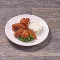 9 Bone in Buffalo Wings · Your choice of hot or BBQ, served with, ranch or blue cheese.