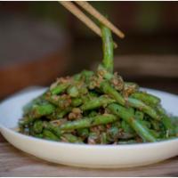 Hunan Style Green Beans · Pickled kohlrabi, garlic, fresco, chilies, fiery garlic chili sauce.