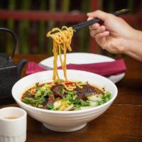 Taiwan Beef Noodle Soup · Fresh noodles, braised beef shank, baby bok choy, pickled mustard greens.