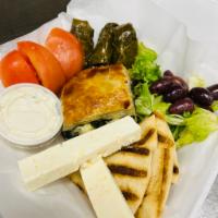 Greek Vegetarian Platter · Spinach pie, stuffed grape leaves, feta cheese, pita bread, tzatziki sauce, Kalamata olives,...