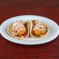 Fish Taco · Fish seasoned over Jack cheese with pico de gallo and Baja sauce. Choice of corn or flour to...