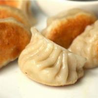 12. Pan Fried Dumplings · 8 fried dumplings (please specify if you want meat or vegetable dumplings in the instructions)