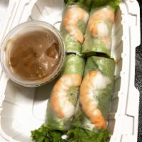 A1. Summer Roll · Rice paper, vermicelli, shrimp, cucumber, lecttuce, pickles, basil, served with our home-mad...