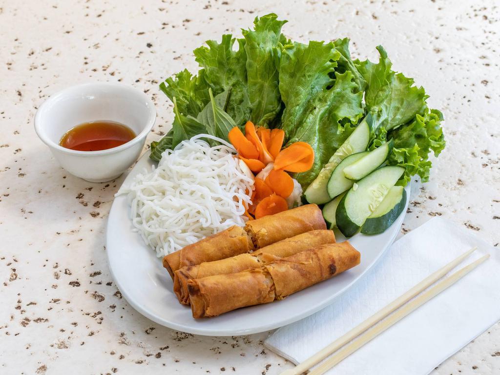 A2. Spring Roll · Wheat flour shell, vermicelli, pork, carrot, taro, onions, lettuce, pickles, basil, cucumber, served with fish sauce.