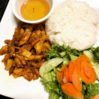 L2. Lemongrass Chicken with Rice · Garlic, chili, cucumber, lettuce, cabbage, pickles, dressing, served with our fish sauce