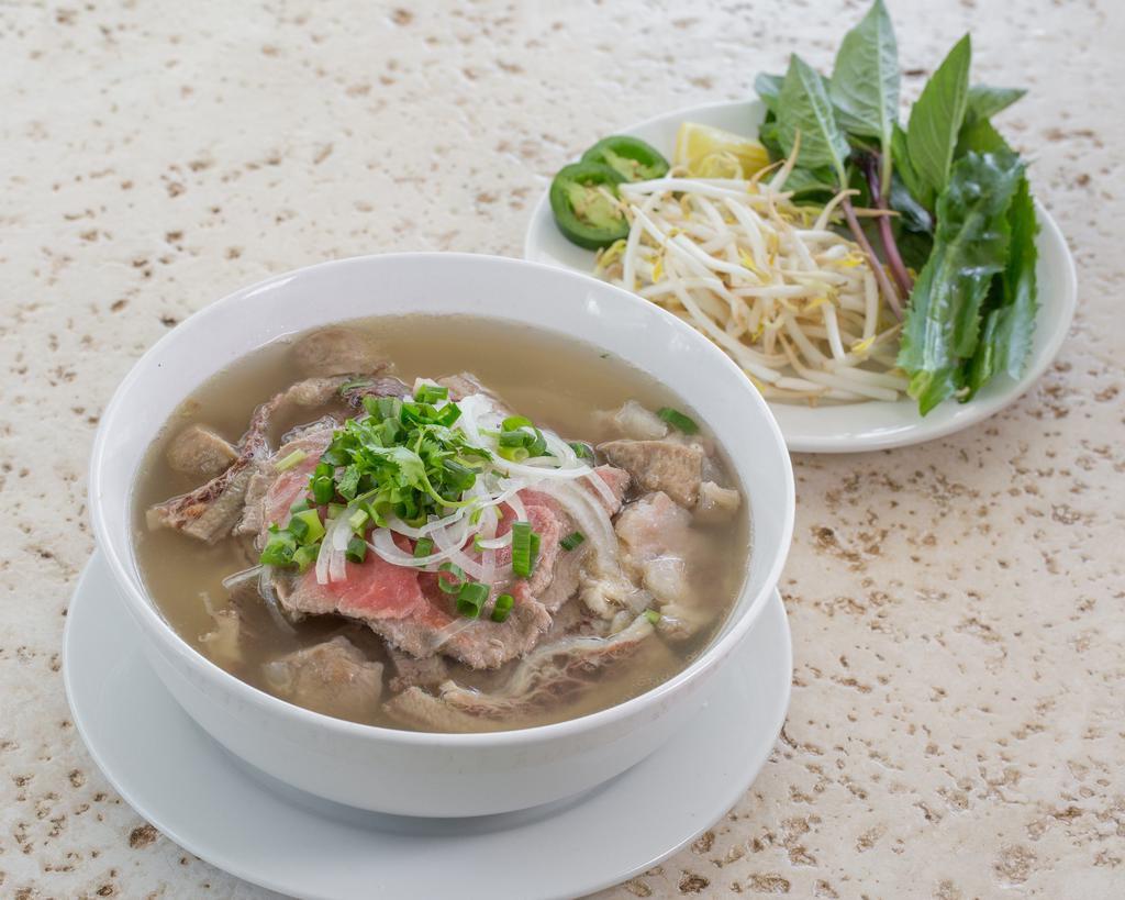 P2. Beef Pho Noodle Soup Dinner · Your choices of rare-steak, brisket, meatball, culantro, onions, pepper, beansprouts, basil, jalapeno, lime.