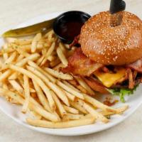 Western Burger · 1/2 lb all natural Angus chuck, American cheese, bacon, lettuce, tomatoes, crispy onion stri...