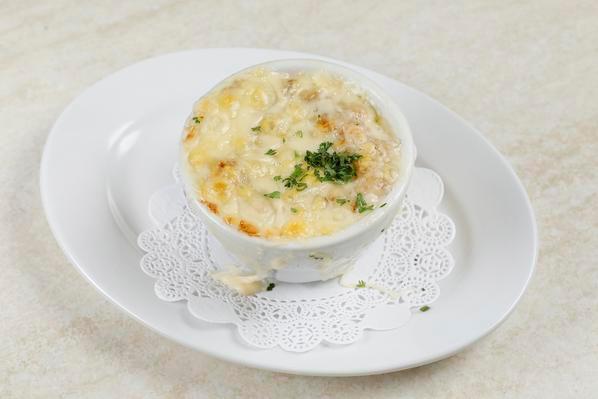 French Onion  Soup · Crispy swiss cheese and croutons  