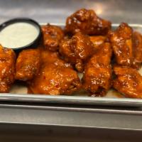 Chicken Wings  · 12 pieces with choice of Habanero or Classic Buffalo Sauce and side Ranch Dressing