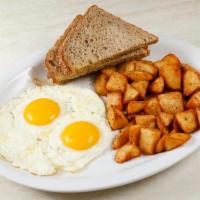 Eye Opener · 2 eggs any style. Served with rosemary garlic potatoes and choice of toast. 