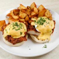 Fried Chicken Benedict · Served with two poached eggs, hollandaise sauce on toasted English muffin with rosemary garl...