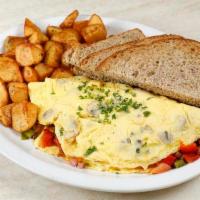 Fillmore Omelette · Three Eggs, Bell Peppers, Mushrooms, Tomatoes, Smoked Pit Ham & Swiss Cheese.  

Served with...