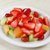Side Fruit Salad · Pineapple, Strawberries, Cantaloupe, Honeydew, Grapes and Seasonal Fruit.   Fruit will Chang...