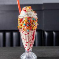 Rainbow Bright · Vanilla ice cream, fruity pebbles, berry syrup, lollipops.