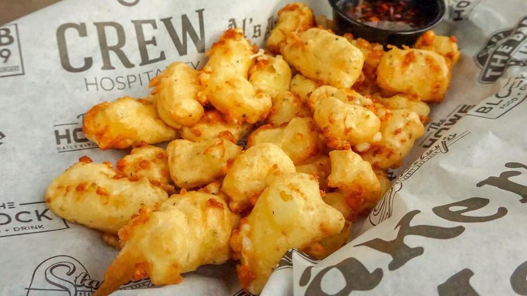 Stanley's Famous Cheese Curds · Hand-battered fresh Wisconsin cheese curds served with spicy jam