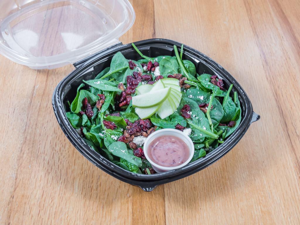Cranberry Apple Spinach Salad · Baby spinach, feta, dried cranberry, Granny Smith apple, chipotle candied pecans, cranberry vinaigrette.