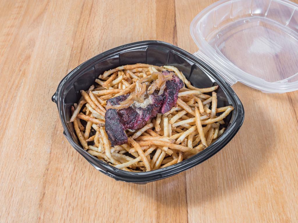 Steak Frites · Flat Iron steak over a tower of shoestring fries, caramelized onions, chimichurri butter, red wine demi.