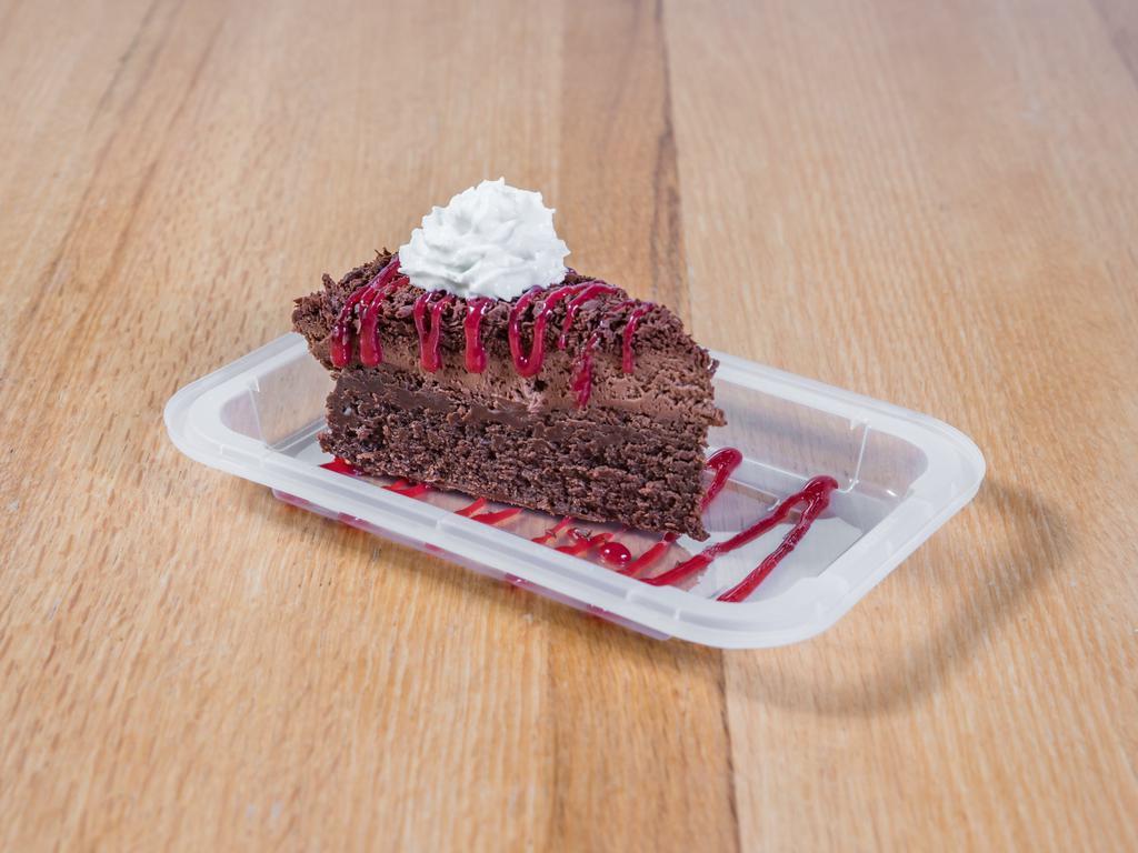 Chocolate Torte · Our handmade flour-less chocolate cake, topped with chocolate mousse and shaved chocolate with raspberry drizzle.