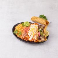 Combination Platter · One Taco, One Enchilada, Black or Pinto Beans, Spanish Rice, Mexican Crema, Guacamole and Pi...