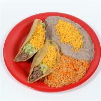 #2. Two Beef Tacos Combo · Two crispy tacos choice of beef, shredded or ground beef (lettuce and cheese). Rice and bean...