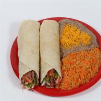 #7. Two Shredded Beef Burritos Combination · Two Shredded Beef burritos (beef cooked with Bell Pepper, tomato and Onion). Rice and beans ...